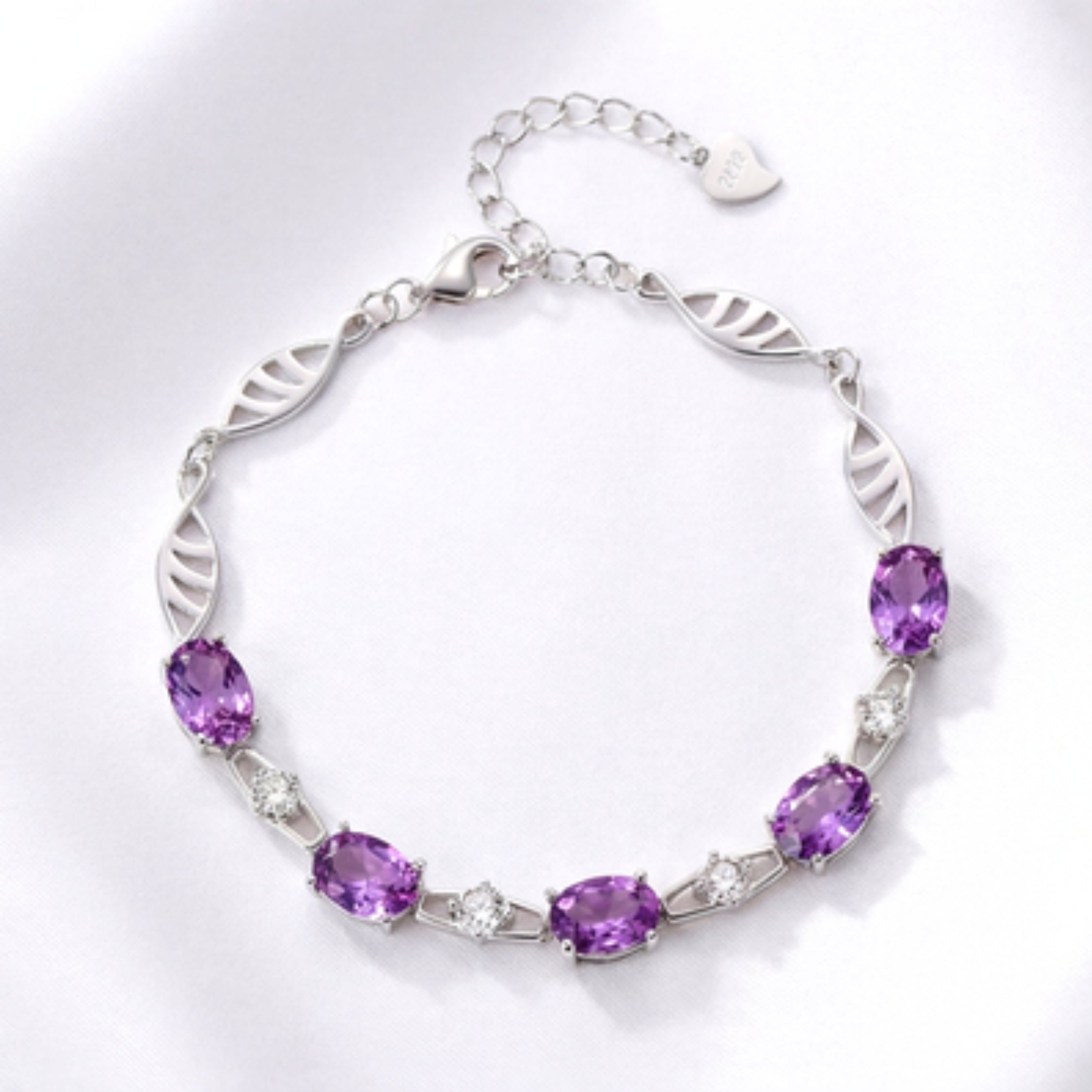 February Oval Cut Birthstone Infinity Link Bracelet - Sterling Silver with Amethyst-Tone Zircon