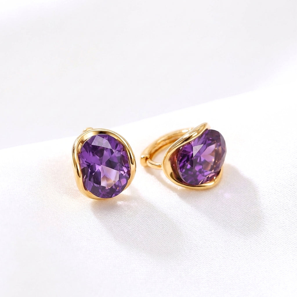 February Oval Cut Birthstone Huggie Earrings - Gold Plated Sterling Silver with Amethyst-Tone Zircon