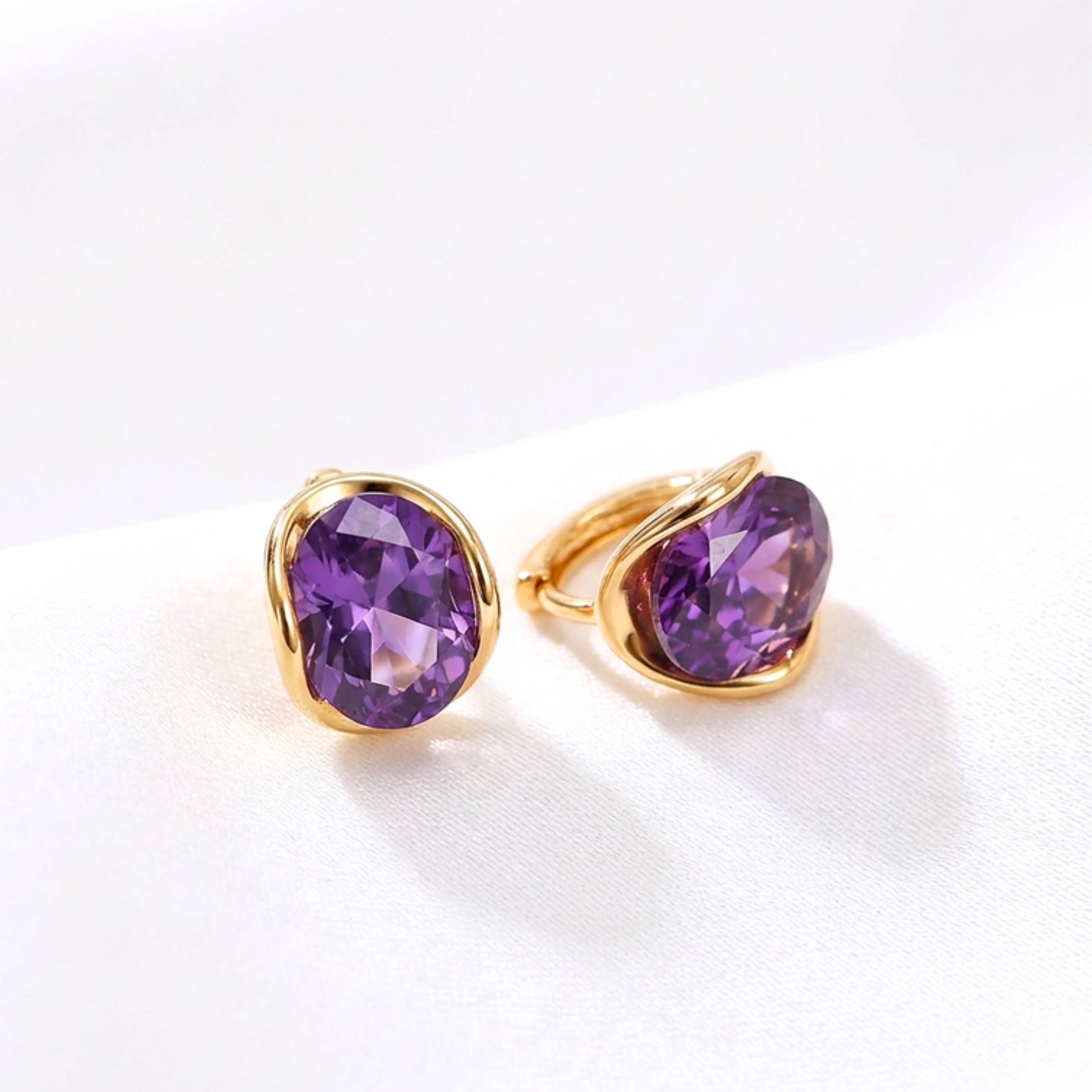 February Oval Cut Birthstone Huggie Earrings - Gold Plated Sterling Silver with Amethyst-Tone Zircon