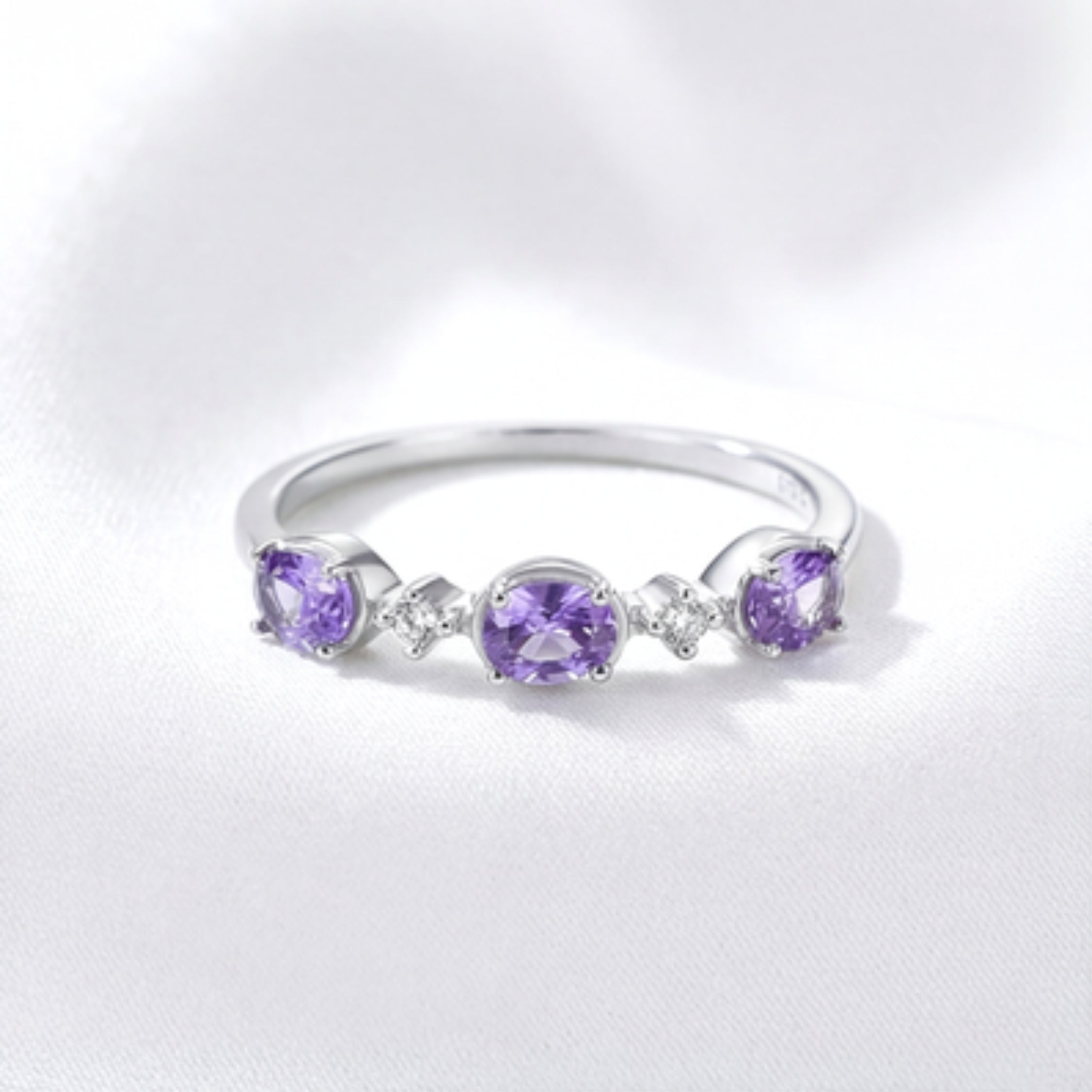 February Oval Cut Three-Stone Birthstone Ring - Sterling Silver with Amethyst-Tone Zircon