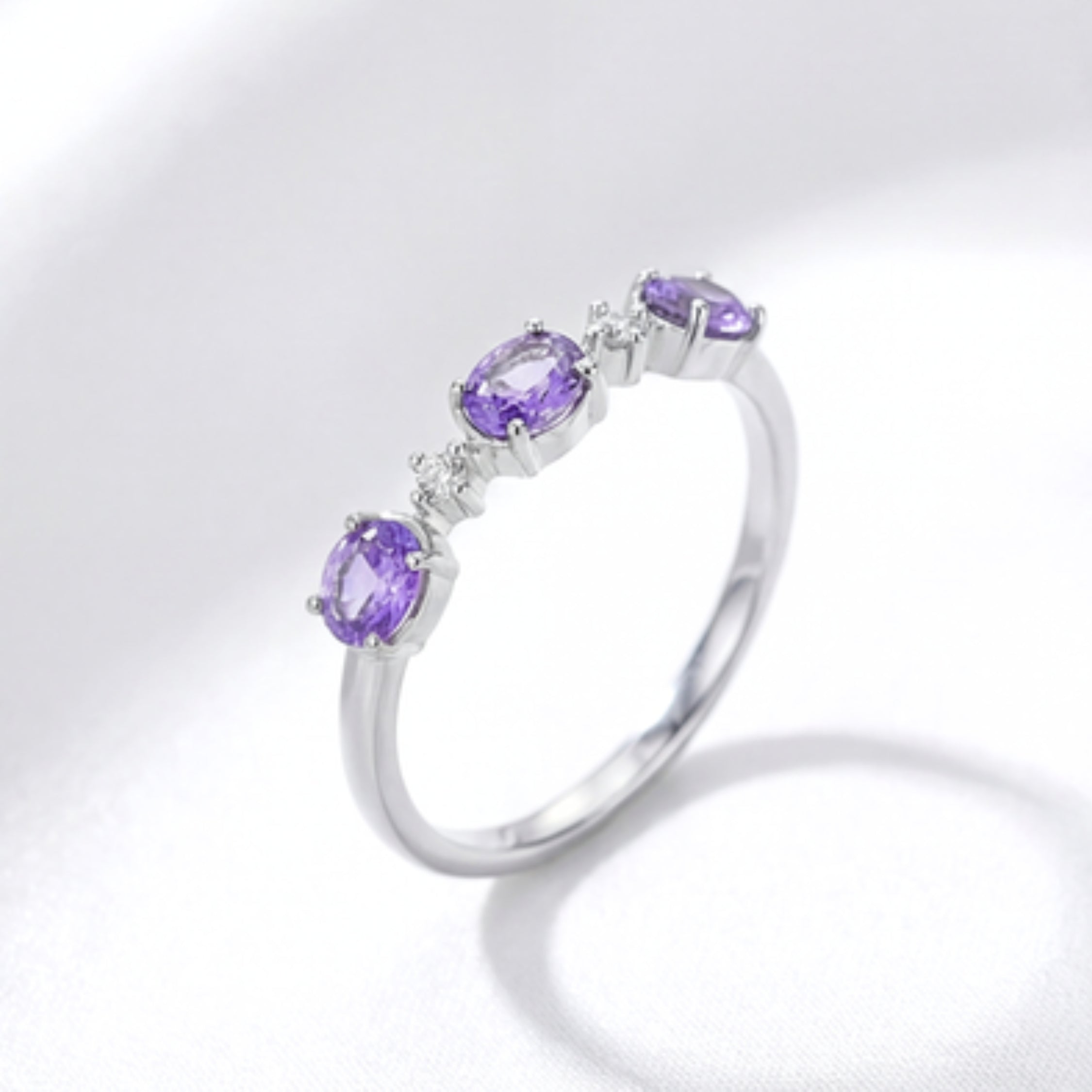 February Oval Cut Three-Stone Birthstone Ring - Sterling Silver with Amethyst-Tone Zircon