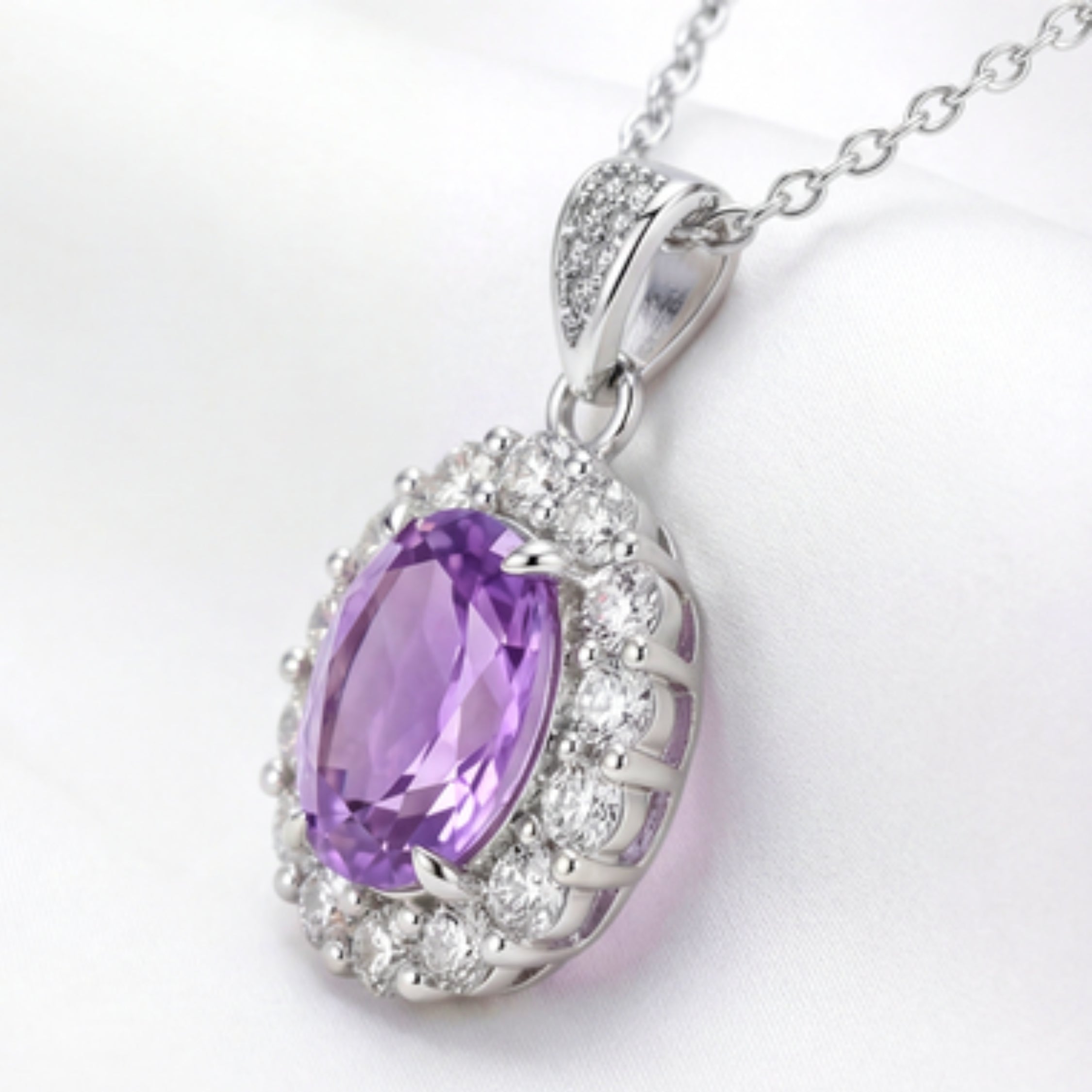 Oval Cut Birthstone Halo Pendant Necklace - Sterling Silver with Zircon