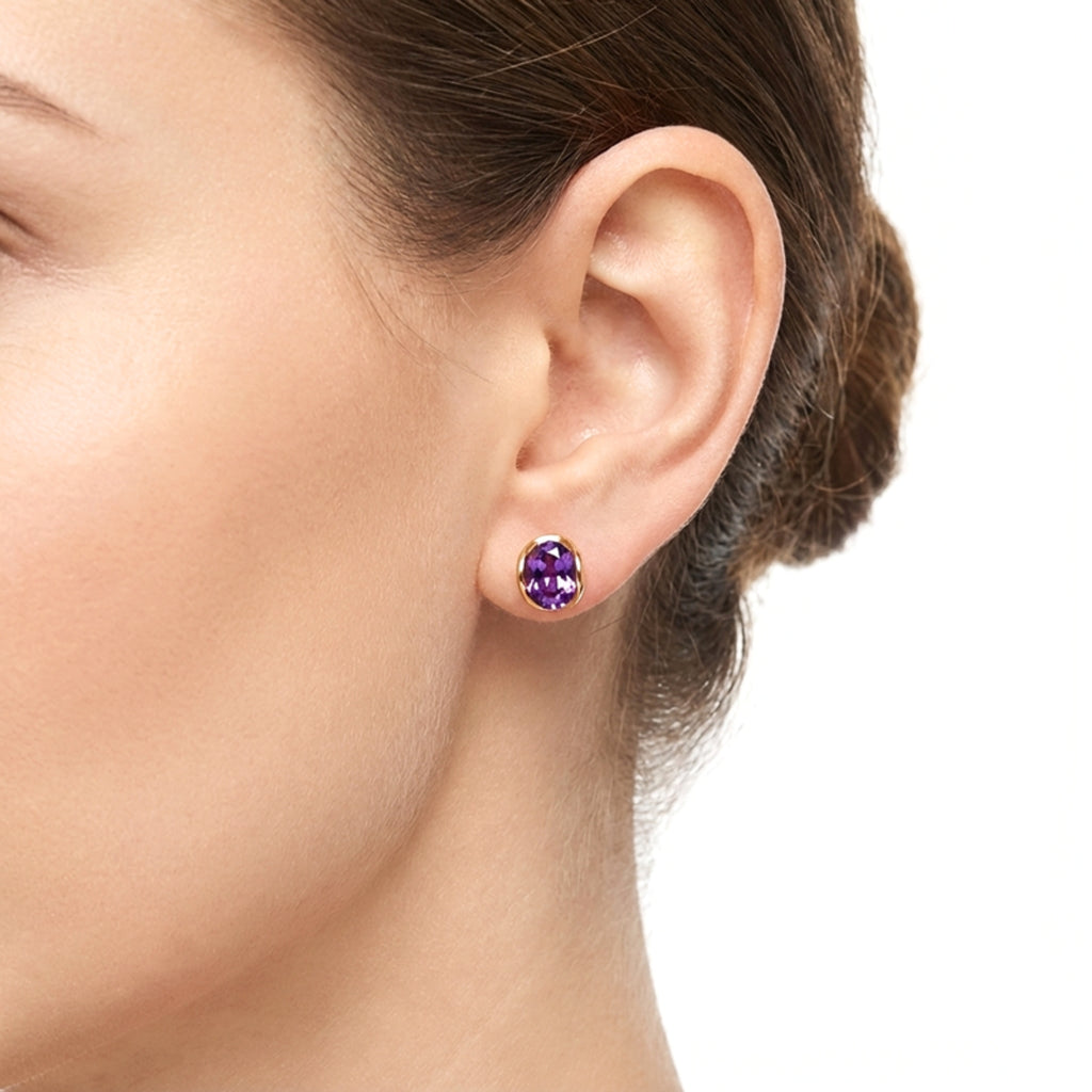 February Oval Cut Birthstone Huggie Earrings - Gold Plated Sterling Silver with Amethyst-Tone Zircon